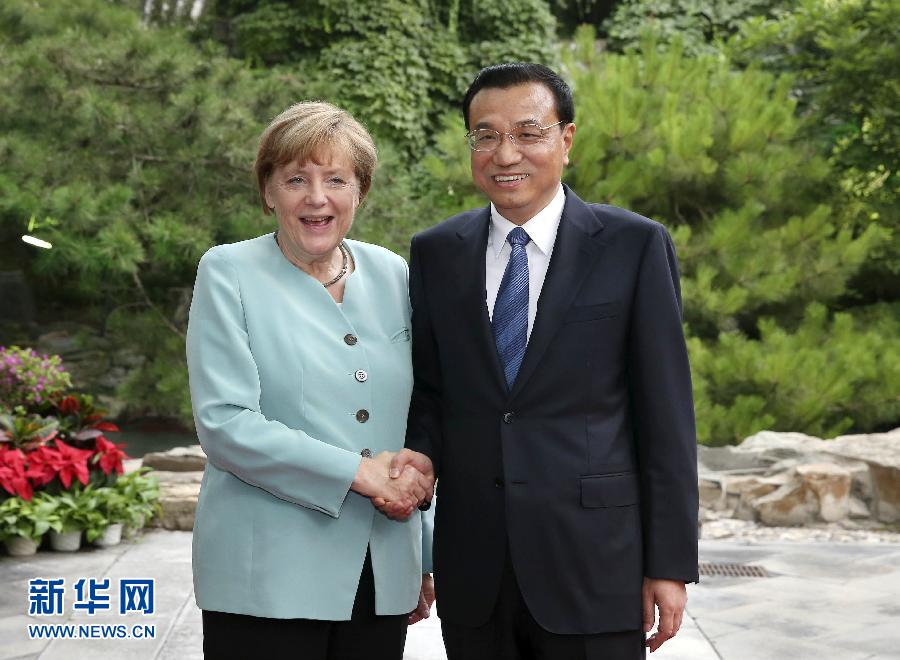 7月6日，國務院總理李克強在北京釣魚臺養源齋會見來華進行正式訪問的德國總理默克爾。 新華社記者 龐興雷 攝 