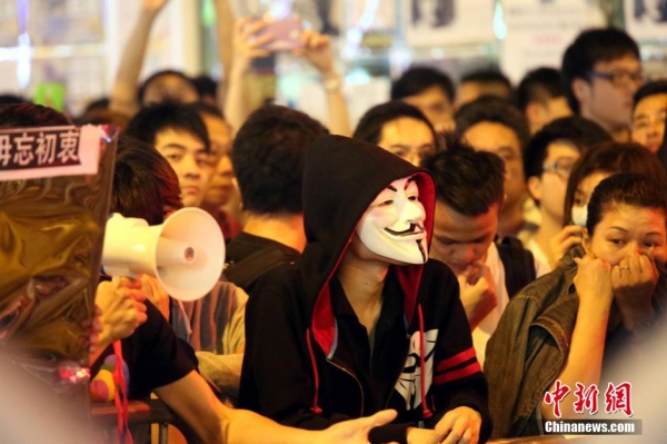 香港“占中”者為逃避法律責任而蒙面行動(組圖)