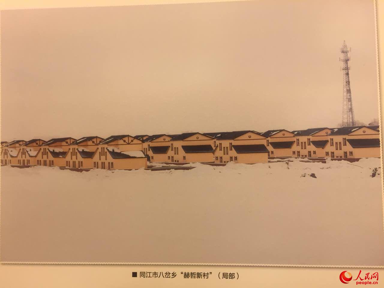 獨家:赫哲族全國人大代表向李克強展示洪災后重建面貌(圖)【8】
