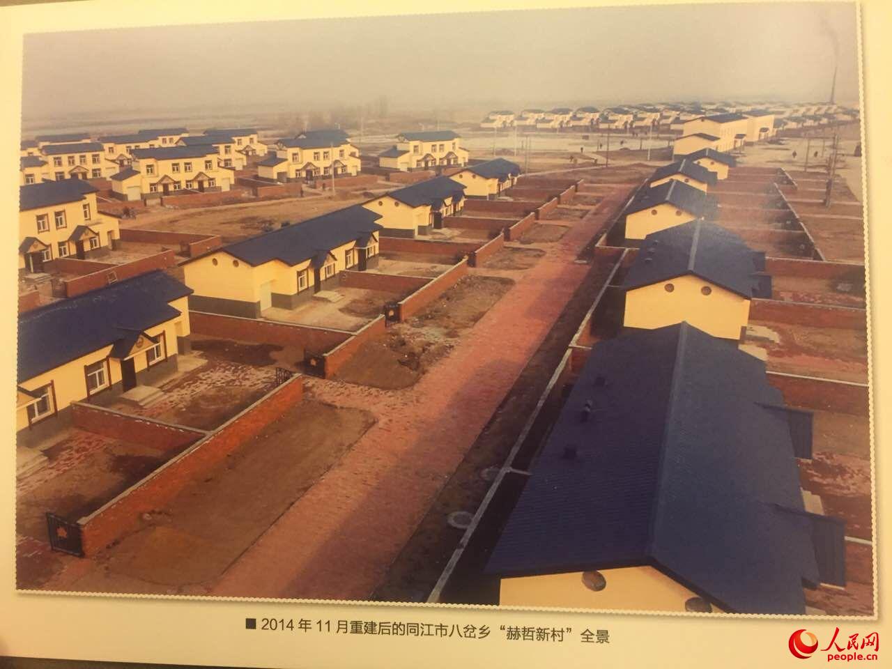 獨家：赫哲族全國人大代表向李克強展示洪災后重建面貌（圖）【9】