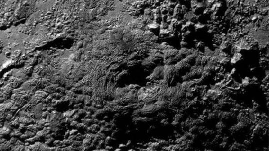 NASA曝光冥王星50個重大發現 冰火山領銜