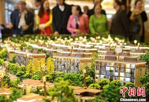“四限”致五一樓市現分化：一線觀望二三線依火熱