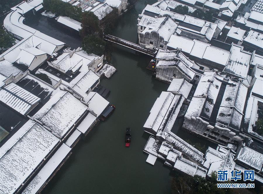 （美麗中國）（11）江南水鄉變身“冬日雪鄉”
