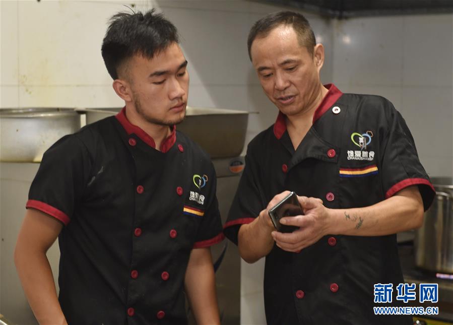 (圖片故事)(13)“無聲外賣”托起自食其力生活希望