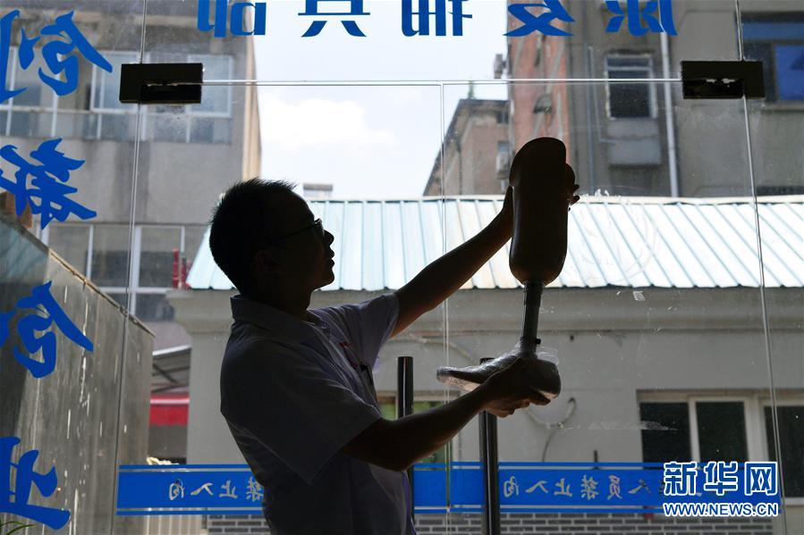 (圖片故事)(5)“修復人生”的工匠