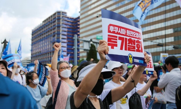 韓國(guó)民眾游行抗議日本核污染水排海（高清組圖）